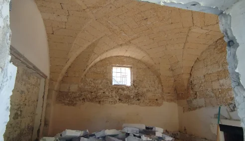 Site photograph — ground floor with the plaster removed
